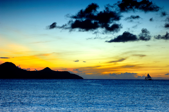 Mayreau Island Sunset with sailboat